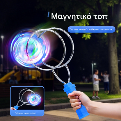 Φωτεινή μαγνητική σβούρα με χειροκίνητη κίνηση, ένα μικρό παιχνίδι για παιδιά.